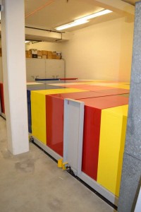 The first tier of cabinets is installed on the carriages.